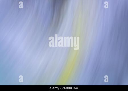 Blue lilac wavy ripples with a yellow stripe in the middle. Abstract background. Backdrop Stock Photo