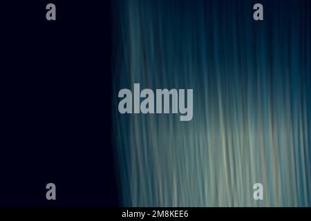 Black with vertically diagonal dimensional abstract waves background, ripples and highlights in cold blue tones. Backdrop Stock Photo