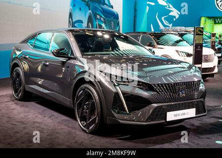 New Peugeot 408 plug-in hybrid car presented at the Brussels Autosalon European Motor Show. Brussels, Belgium - January 13, 2023. Stock Photo