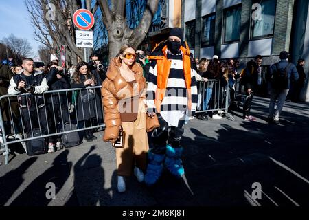 Milan, Italy. 14th Jan, 2023. Guest is seen at Armani show during Milan Fashion Week Menswear Fall/Winter 2023/2024 in Milano Credit: SOPA Images Limited/Alamy Live News Stock Photo