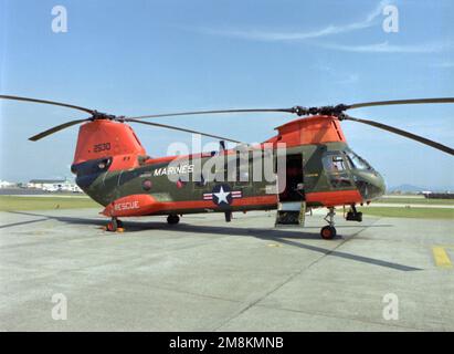 A right side view of an HH-46D Seaknight helicopter on the flightline. Base: Marine Corps Air Station,Iwakuni Country: Japan (JPN) Stock Photo