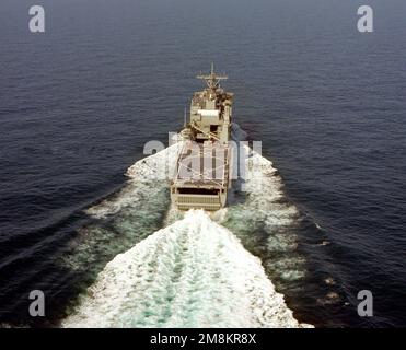 An aerial stern-on view of the amphibious dock landing ship USS OAK HILL (LSD-51) underway during builders sea trials. Country: Gulf Of Mexico Stock Photo