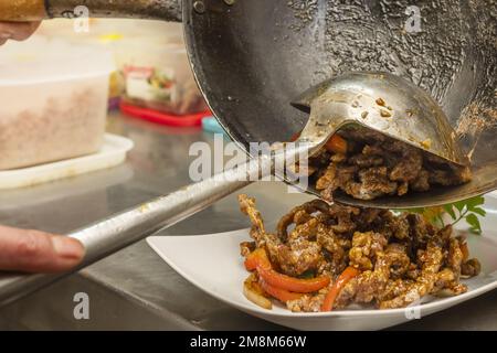 Large wok hi-res stock photography and images - Alamy