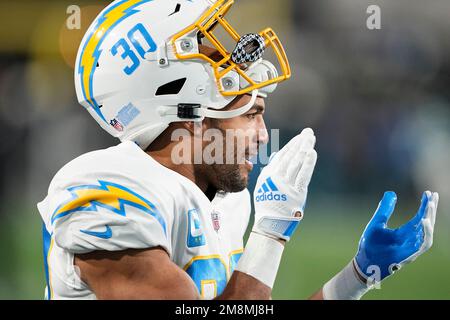 Jacksonville, USA. 14th Jan, 2023. Running Back Austin Ekeler runs for a  touchdown in the first quarter as the Chargers compete against the Jaguars  in the NFL Wildcard Playoff game at the