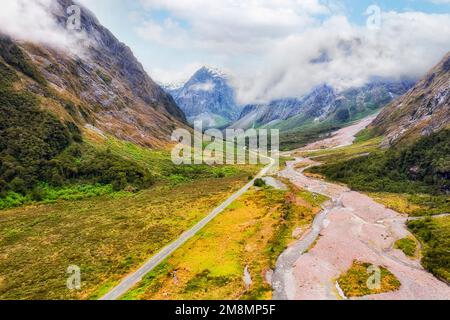 Monkey creek valley highway to Milford Sound fiord in New Zealand - scenic mountain landscape. Stock Photo