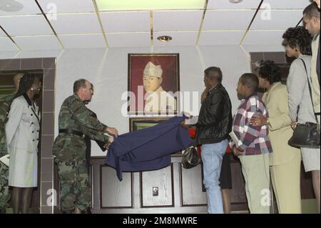 Major General (MGEN) Morris J. Boyd, USA, Deputy Commanding General, III Corps assists the Rivers family in unveiling the portrait and plaque during the rededication ceremony of Building 121. This rededication ceremony is in memory of Medal of Honor awardee STAFF Sargeant (SSGT) Ruben Rivers, USA, A Co., 761st Tank Battalion. Base: Fort Hood State: Texas (TX) Country: United States Of America (USA) Stock Photo