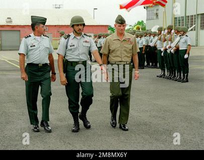 GEN Charles I. Wilhelm, the CINC SOUTHCOM Commander reviews the Puerto Rico Army National Guard (PRARNG) Honor Guard at the Air National Guard airport field. Along with him are left to right: MGEN Emilio Diaz Colon, The Adjutant General, Puerto Rico Army National Guard, and MAJ Sigfredo Perez, the Administrative Officer-Army National Guard and GEN Charles I. Wilhelm, USMC CINC SOUTHCOM. Base: Fort Buchanan, San Juan State: Puerto Rico (PR) Country: United States Of America (USA) Stock Photo