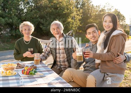 Happy family here for a picnic Stock Photo