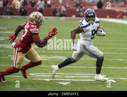 California, USA. 14th Jan, 2023. Seattle Seahawks running back Kenneth Walker III (9) outruns San Francisco 49ers linebacker Dre Greenlaw (57) for a 7 yard TD in the second quarter of the NFC Wildcard game at Levi's Stadium in Santa Clara, California on Saturday, January 14, 2023. The 49ers defeated the Seahawks 41-23. Photo by Terry Schmitt/UPI Credit: UPI/Alamy Live News Stock Photo