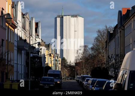 Rostock, Germany. 03rd Jan, 2023. The water tower has been stuck under a white tarp since renovation began in May 2018. According to the current plan, the renovation of the water tower, which was built in 1903, should be completed in 2024. The tower, which is more than 40 meters high, has long had problems with moisture seeping into the masonry. Credit: Bernd Wüstneck/dpa/Alamy Live News Stock Photo