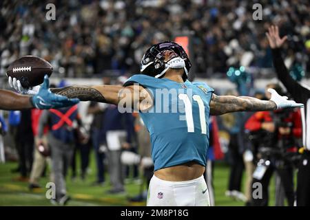 Jacksonville Jaguars wide receiver Marvin Jones Jr. (11) runs onto the  field for an NFL wild-card football game against the Los Angeles Chargers,  Saturday, Jan. 14, 2023, in Jacksonville, Fla. (AP Photo/Gary