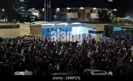 JERUSALEM, ISRAEL - JANUARY 14: Israelis hold up signs during a demonstration against Israel's new government judicial system plan that aims to weaken the country's Supreme Court outside the President's Residence on January 14, 2023, in Jerusalem, Israel. For a second weekend protestors rallied against the wide ranging and controversial reform in Israel's legal system which would boost the power of elected officials and reduce the power of the Israeli High Court of Justice. Credit: Eddie Gerald/Alamy Live News Stock Photo