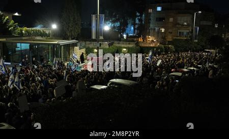 JERUSALEM, ISRAEL - JANUARY 14: Israelis hold up signs during a demonstration against Israel's new government judicial system plan that aims to weaken the country's Supreme Court outside the President's Residence on January 14, 2023, in Jerusalem, Israel. For a second weekend protestors rallied against the wide ranging and controversial reform in Israel's legal system which would boost the power of elected officials and reduce the power of the Israeli High Court of Justice. Credit: Eddie Gerald/Alamy Live News Stock Photo