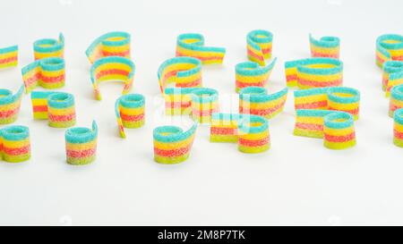 Assorted colorful gummy candies. Top view. Jelly donuts. Jelly bears. Isolated on a white background. Stock Photo