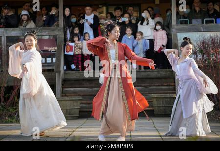 Ottawa, Canada. 14th Jan, 2023. Dancers perform traditional Chinese dance at the Lunar New Year Market hosted by University of British Columbia (UBC) Botanical Garden in Vancouver, British Columbia, Canada, on Jan. 14, 2023. The festive event, hosted for the first time by UBC Botanical Garden, features artisan markets and various performances to welcome the Year of the Rabbit. Credit: Liang Sen/Xinhua/Alamy Live News Stock Photo