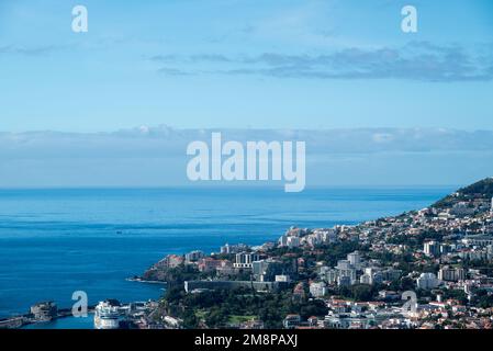 View over Funchal and a calm sea from blandy's park on Madeira Portugal. Stock Photo