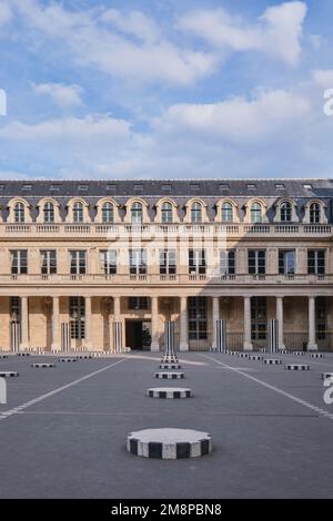 Paris, France - May 18, 2022: The Palais royal, former royal palace, Larger inner courtyard of the palace, has since 1986 contained Daniel Buren