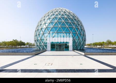 Symmetrical view of the modern-looking light blue spherical visitor center of the Sheik Zayed mosque at Abu Dhabi Stock Photo