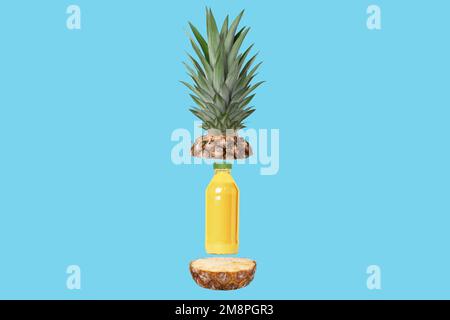 Bottle of freshly squeezed pineapple juice. Sliced pineapple around the bottle. In flight. concept. On a blue background. Stock Photo