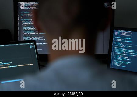 Stressed programmer coding. Web code and software developement Stock Photo