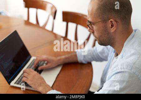 Male coding on laptop. Web developing and software code concept Stock Photo