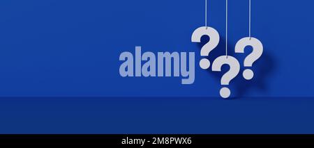 Three white question marks a blue wall panoramic background. 3D rendering. Stock Photo