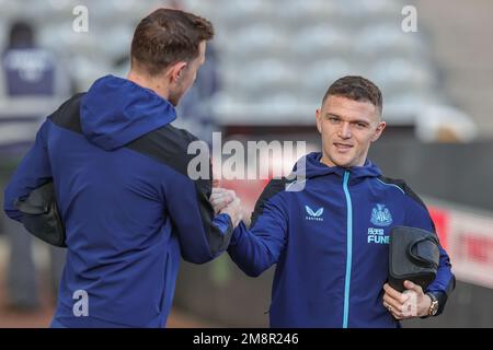 Chris Wood #20 of Newcastle United and Kieran Trippier #2 of Newcastle United shake hands as they arrive ahead of the Premier League match Newcastle United vs Fulham at St. James's Park, Newcastle, United Kingdom, 15th January 2023  (Photo by Mark Cosgrove/News Images) Stock Photo