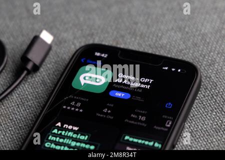 Woman's hand holding an iPhone with appstore and ChatGPT and Chat bot apps, artificial intelligence time. 01.01.2023 Amsterdam, Netherlands Stock Photo