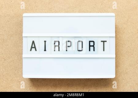 Lightbox with word airport on wood background Stock Photo