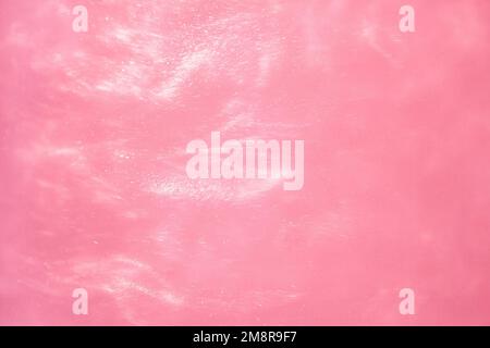 delicate pink background with sequins waves liquid motion Stock Photo
