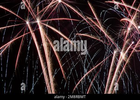 A fireworks display against the night sky Stock Photo