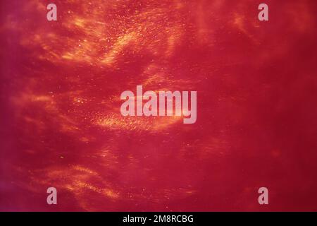 abstract red background with sparkles liquid waves and motion Stock Photo