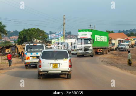 Driving on paved roads / highways in Uganda, Eastern Africa, photographed from inside a moving vehicle. Stock Photo