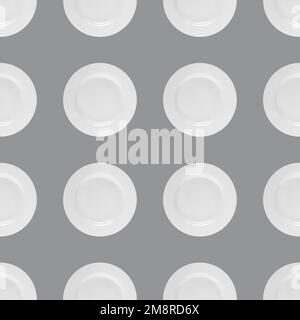 Seamless background with white ceramic plate on gray background Stock Photo