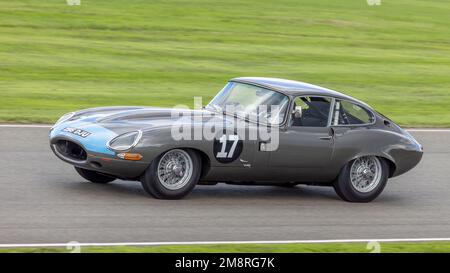 Richard Meins and Rob Huff's 1963 Jaguar E-Type FHC, Stirling Moss Memorial Trophy entrant, at the 2022 Goodwood Revival, Sussex, UK. Stock Photo