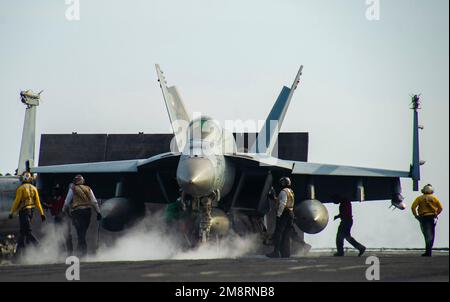 USS Nimitz, United States. 14th Jan, 2023. A U.S. Navy F/A-18E Super Hornet fighter aircraft from the Kestrels of Strike Fighter Squadron 146, is prepared for launch on the flight deck of the Nimitz-class aircraft carrier USS Nimitz underway conducting routine operations, January 14, 2023 in the South China Sea. Credit: MCS Emma Burgess/U.S Navy Photo/Alamy Live News Stock Photo