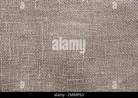 Cloth. The texture of the burlap fabric is close-up. Packaging material. Background Of Burlap Hessian Sacking Stock Photo
