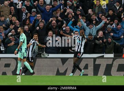 15th January 2023; St James' Park, Newcastle, England: Premier League Football, Newcastle United versus Fulham; Newcastle United's Alexander Isak (14) celebrates after he scores his side's first goal in the 89th minute to make it 1-0 with Jacob Murphy close by Stock Photo