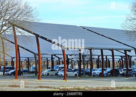 Solar panels installed in parking lot. Padua, Italy - January 2023 Stock Photo