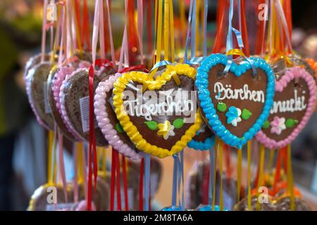 Christmas goods on sale in winter market stalls, Germany, Winter 2022 Stock Photo