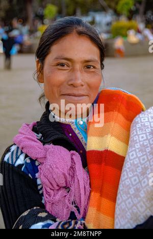 Faces of Mexico: Woman Sells Blankets in Town Square in Chiapas Stock Photo