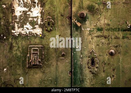 rusty door lock with deadbolt, on weathered wooden door, Valletta, Malta, Europe Stock Photo