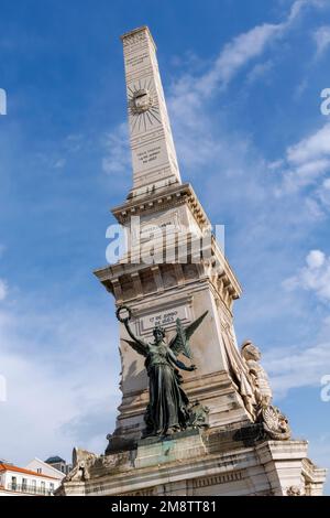 Lisbon Portugal.  Praca dos Restauradores.  The obelisk, known as the Monumento aos Restauradores, or Monument to the Restorers, celebrates those who Stock Photo