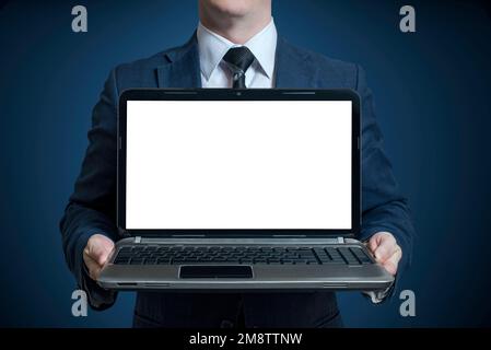 Businessman holding an open notebook laptop Stock Photo