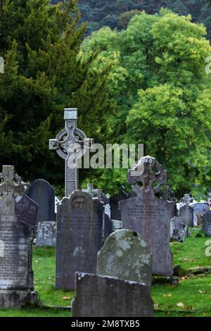 Medieval stone cross of the Glendalough monastery in the Wicklow mountains in Ireland Stock Photo