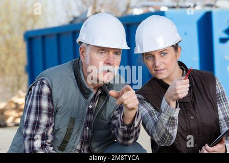 environmental workers thinking of a plan Stock Photo
