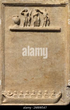 Ancient stone wall with carving relief for background and frame from Roman Greek culture. Copy space for your text. Theme of antique, wallpaper, desig Stock Photo