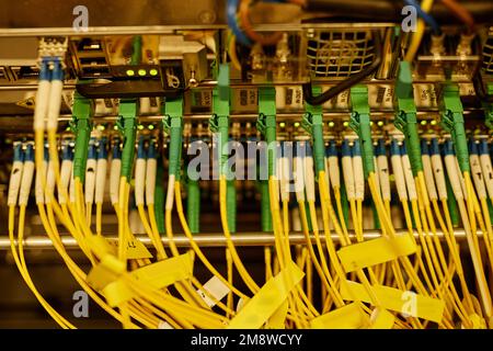 Background image of neat cable arrangement in server cabinet, copy space Stock Photo
