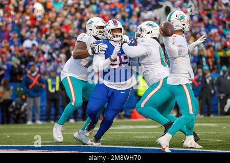 Buffalo Bills defensive tackle Tim Settle (99) prepares to walk