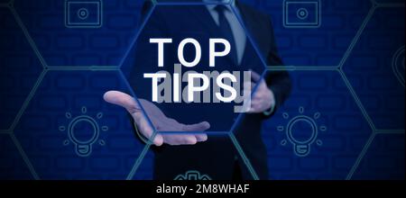 Text sign showing Top Tips. Word Written on a small but particularly useful piece of practical advice Stock Photo